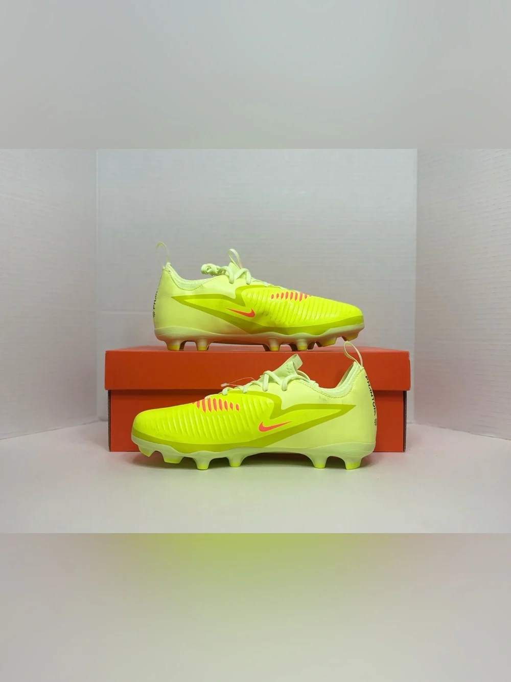 Nike Neon Yellow Soccer Cleats with Orange and Black Accents